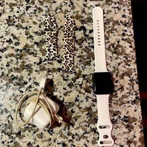 both watch bands, the watch & the charger.